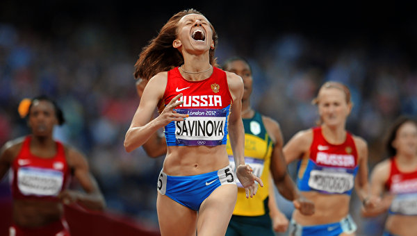Россиянка Мария Савинова, выигравшая золотую медаль в забеге на 800 м в Лондоне