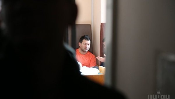 Роман Насиров в кресле судьи в зале заседаний Соломенского районного суда