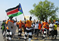 Местные жители во время народных гуляний по поводу независимости Южного Судана