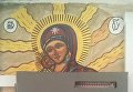 Житель Ужгорода разрисовал подъезд многоэтажки картинами на религиозную тематику