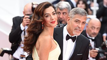 Актер Джордж Клуни с супругой Амаль. Архивное фото