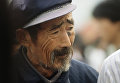 Пожилой китаец. Архивное фото