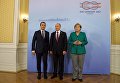 Путин, Меркель и Макрон на саммите Группы двадцати в Гамбурге