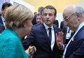 Канцлер Германии Ангела Меркель и президент Франции Эммануэль Макрон (слева направо) на полях саммита лидеров Группы двадцати G20 в Гамбурге