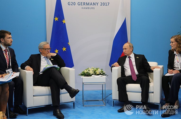 Президент РФ Владимир Путин и председатель Европейской комиссии Жан-Клод Юнкер