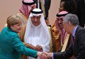Канцлер Германии Ангела Меркель и государственный министр Саудовской Аравии Ибрагим Абдулазиз аль-Ассаф