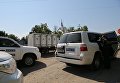 Машины ОБСЕ на блокпосту в Новоазовске