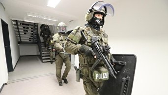 Полиция провела обыски в приюте для беженцев нападения мигранта в Гамбурге
