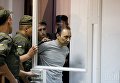 Подозреваемый в госизмене полковник ВСУ Иван Безъязыков останется под стражей до 8 октября. На фото - заседание суда 9 августа.