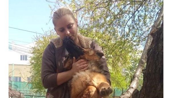 Одесситка Ольга Трошина и собака, над которой она якобы издевалась