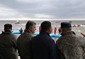 Накануне Дня спасателя президент Петр Порошенко посетил учения ГСЧС в Киевском море.
