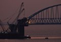 Арка Крымского моста днем и на закате