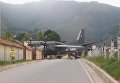Военный самолет врезался в полицейскую базу в Перу