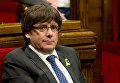 Глава женералитета (правительства) Каталонии Карлес Пучдемон на заседании парламента Каталонии, на котором депутаты проголосовали за независимость от Испании