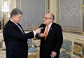 Президент Украины Петр Порошенко и экс-мэр Нью-Йорка Рудольф Джулиани во время встречи в Киеве