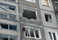 Дом, пострадавший в результате обстрела в Донецке. Архивное фото