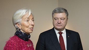 Президент Украины Петр Порошенко и директор-распорядитель МВФ Кристин Лагард на Экономическом форуме в Давосе