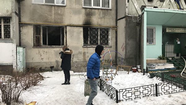 Место пожара в многоэтажке на киевской борщаговке
