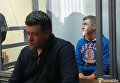 Контрактник ВСУ Владимир Балабух (на заднем плане) подозревается в убийстве человека в Киеве