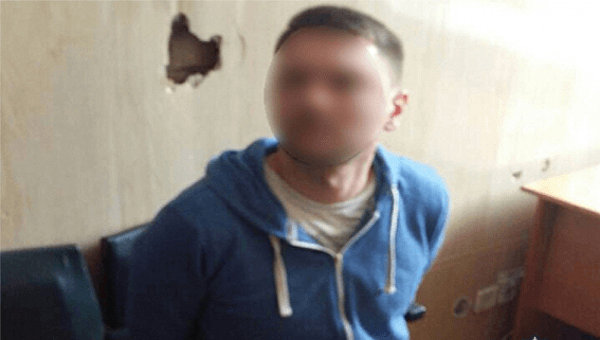 Мужчина, который напал с топором на авто в Киеве
