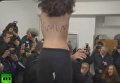 Активистка Femen оголилась перед Берлускони во время голосования