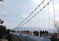 Самый высокий в мире стеклянный мост открылся в Китае