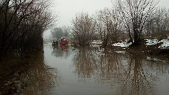 Под Киевом на 1,5 м затопило часть дороги