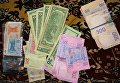 Деньги, изъятые у винницких полицейских, которых подозревают в торговле людьми и крышевании проституции