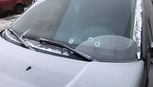 Расстрелянный джип Range Rover львовского полицейского