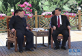 Председатель КНР Си Цзиньпин и лидер КНДР Ким Чен Ын