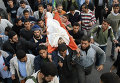 Палестинские боевики хоронят товарищей, погибших в столкновениях с израильскими военными
