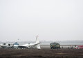 Обломки упавшего самолета Ан-24 под Донецком