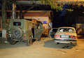 Обстрелянный автомобиль у воинской части в Луганске