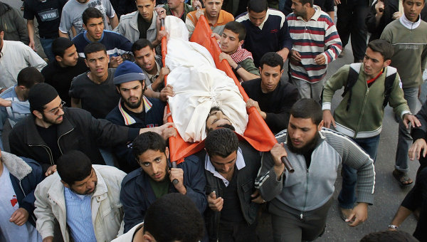 Палестинские боевики хоронят товарищей, погибших в столкновениях с израильскими военными