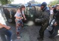 Активисты бьют машину у посольства РФ в Киеве
