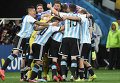 Игроки сборной Аргентины радуются победе в полуфинальном матче
