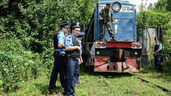 Поезд с погибшими в крушении Boeing 777 прибыл в Харьков