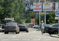 Билборд с плакатом Воин русской армии, спаси! на одной из улиц города Донецка (9 июля 2014)