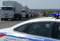 Первые КамАЗы с гуманитарной помощью из РФ прибыли к КПП на границе с Украиной