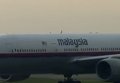 Останки девяти жертв сбитого Boeing доставили в Малайзию