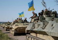 Через Славянск под украинскими флагами прошла колонна военной техники