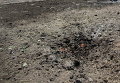 Воронка от взрыва мины. Архивное фото