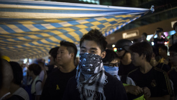 Сторонники протестного движения Occupy Central на митинге в районе Mong Kok в Гонконге. Архивное фото