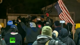 В США протестующие возмущены убийством еще одного темнокожего подростка