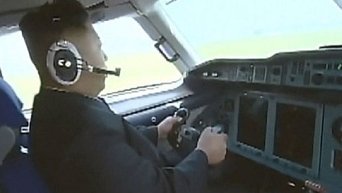 Ким Чен Ын за штурвалом самолета
