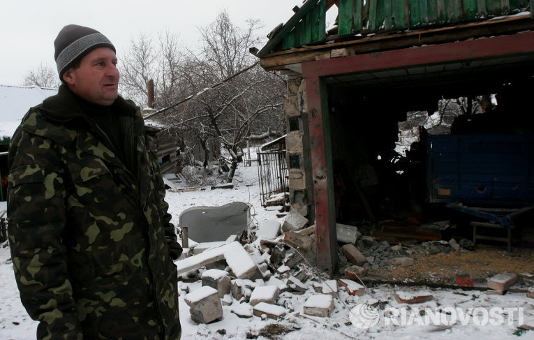 Последствия обстрела Петровского района Донецка