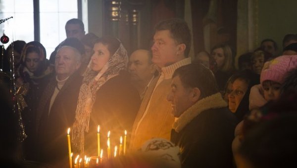 Марина и Петр Порошенко во время рождественского богослужения