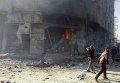 Последствия авиаудара вблизи сирийской столицы Дамаска