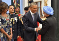 Барак Обама с супругой и бывший премьер Индии Манмохан Сингх