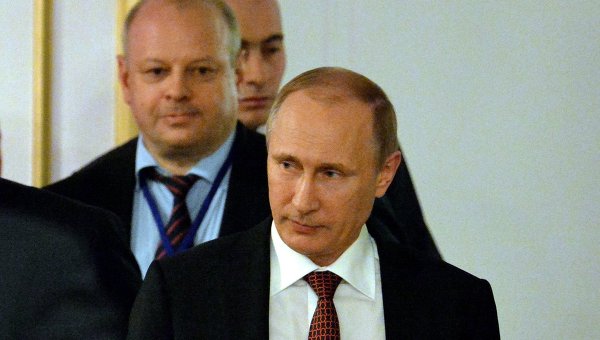 Владимир Путин на переговорах в Минске